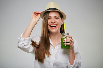 Happy woman with green smoothie jar. Isolated female advertising portrait.