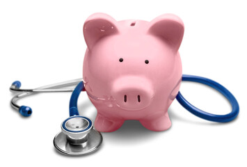 Piggy bank with medical stethoscope isolated on white, health insurance - obrazy, fototapety, plakaty