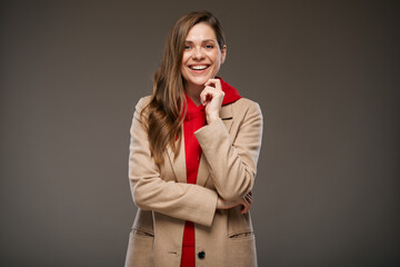 Young modern confident business woman in brown fall coat. Advertising isolated portrait.