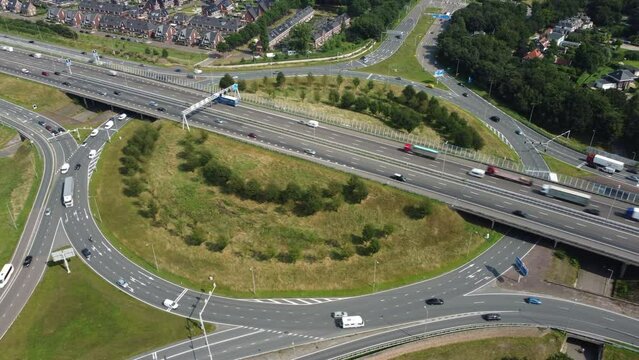 Traffic at a highway junction at Zwolle where the A28 highway runs through the city in Overijssel, The Netherlands.