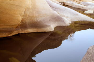 rock formations surrounding the river bed