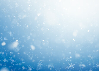 winter blue background of snow and snowflakes illuminated by sunbeams