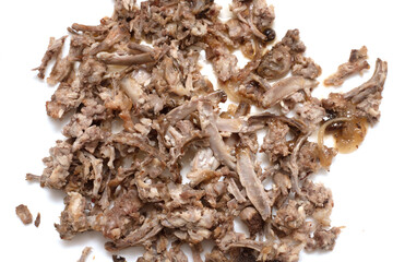 Chicken bones after eating on a white background.