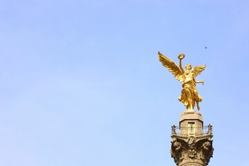 Beautiful shot of the Angel of Independence under the blue sky in Mexico City