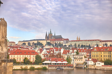 Naklejka na ściany i meble Distant view of Prague Cathedral from Charles Bridge.