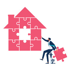 Businessman holding jigsaw pieces to finish a house shape puzzle, solving home mortgage problems concept