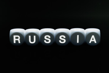 Russia. Cubes with letters on a dark background.Inversion