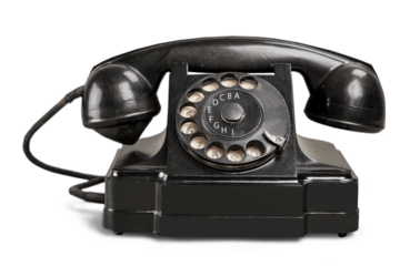 Retro black telephone on white background