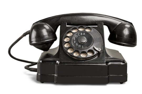 Retro black telephone on white background
