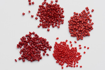 different red plastic granulates für injection moulding
