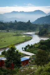 Scenic view of the Doon Valley and a river surrounded by greenery in Dehradun, India