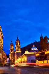 street of historic center at evening , buildings with golden lights in dowton center, zacatecas mexico 