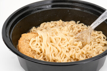 Noodles with bread in bowl isolated on white 