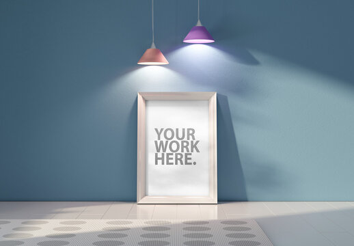 Vertical White Frame Mockup Standing Near Blue Wall with Colorful Lamps