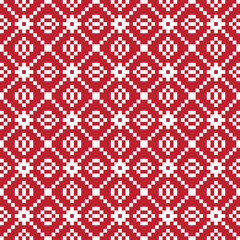 White cross-stitch knitting pattern on red background. White square dots on red backdrop. Fabric pattern design for sale. Knitting handicraft art.