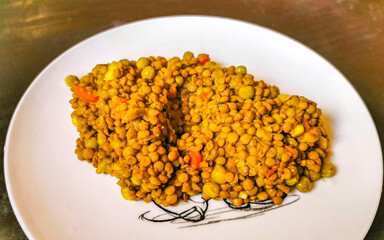 Delicious lentil dish lentil stew with beans vegetables in Mexico.
