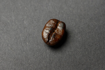 Coffee bean roasted on black background