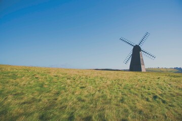 Fototapeta na wymiar Windmill in a Field
