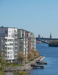 Panorama view from the island the Essingen the Lux district on the island Lilla Essingen at a bay in the lake Mälaren a sunny a color full autumn day in Stockholm