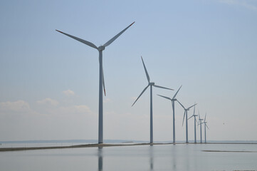 Wind farm windmills on the sea in Denmark
