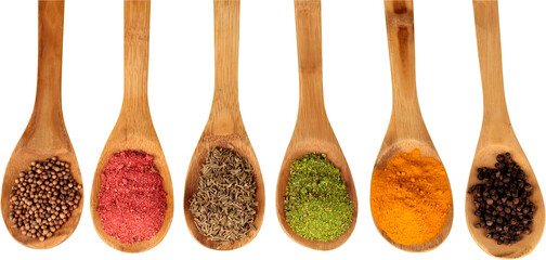 Various colorful spices in spoons on white table