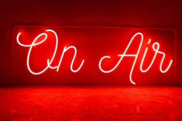 Red neon sign on air. Trendy style. Neon sign. Custom neon. Home decor.