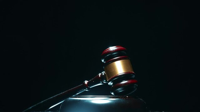 A judge gavel is rotating. Concept of crime or decide a guilty verdict in court