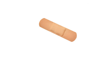 Brown medical band-aid on white background, health