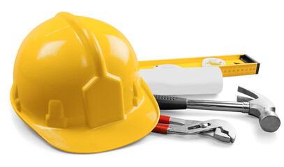 Yellow hard hat and tools on background