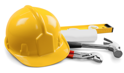 Yellow hard hat and tools on background