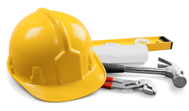 Yellow hard hat and tools on background
