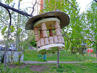Bird feeder made from cork, styrofoam and cardboard
