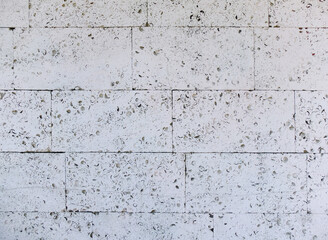 Concrete block wall with textured pattern as background and texture