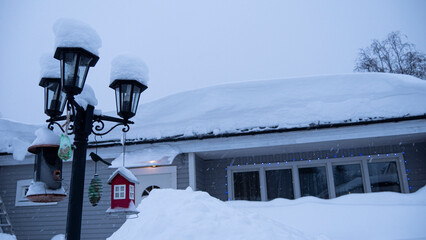 christmas time,  house outside cowered by snow and frost