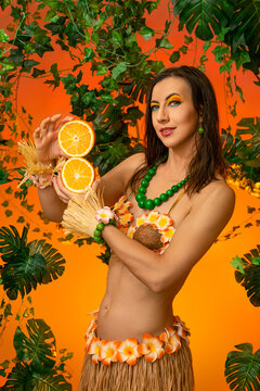 Beautiful young woman in hawaiian costume