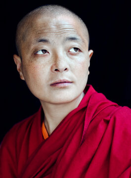 Portrait of a Tibetan Buddhist nun. Mcleod Ganj, Dharamsala, India.