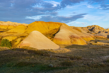 Yellow Mounds Basin With The Peaks of  Dillon Pass, Badlands National Park, South Dakota, USA