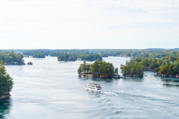 Cruise boat on St. Lawrence River in Thousand Islands area of Ontario