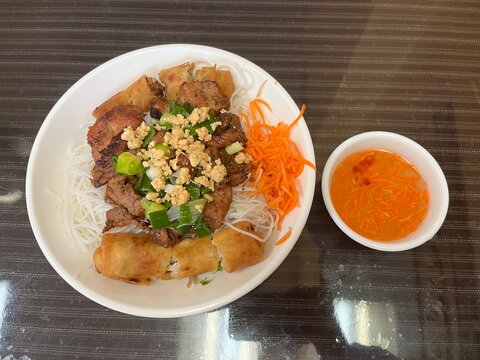 Vietnamese Bun Thit Nuong (a delicious combination of grilled pork, rice noodles, vegetables and fish sauce)