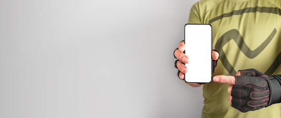 Sport application mockup, blank white mobile phone screen in athlete hand. Ad banner background