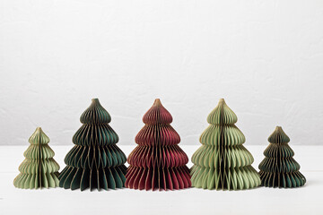Scandinavian christmas paper xmas trees. Modern christmas decoration, minimalist and plastic free