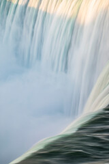 Horseshoe Falls closeup in the morning with mist at Niagara Falls in Canada, slow shutter speed, long exposure