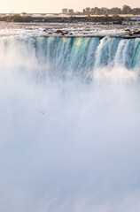 Horseshoe Falls closeup in the morning with mist at Niagara Falls in Canada, slow shutter speed, long exposure