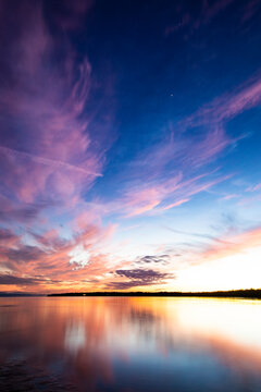 Colorful sunset and reflection at Bruce Peninsula National Park, Singing Sands Beach Tobermory