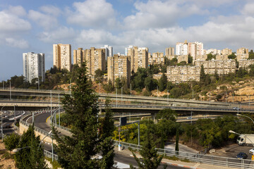 Fototapeta premium HAIFA, ISRAEL - September 29, 2022: Highway interchange with traffic on multiple levels, Aerial image.