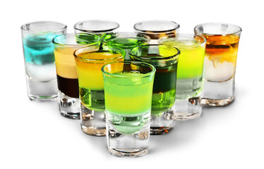 Colourful shot drinks on a white background with reflections