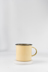 Enamel cup with a black rim, pastel yellow enamel cup	