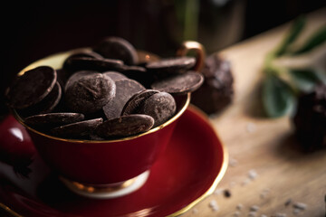 chocolate buttons in a china mug