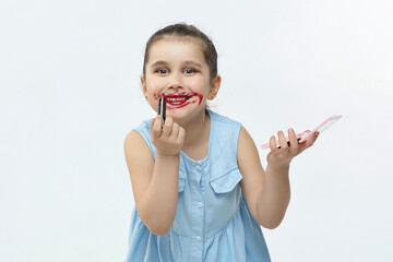 little black-haired girl smeared red lipstick. funny photo shoot in the studio on a white background