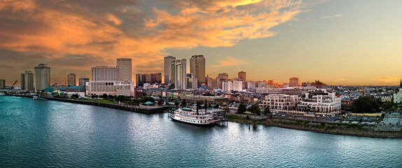New Orleans River Paddle boat with colorful sunset - obrazy, fototapety, plakaty